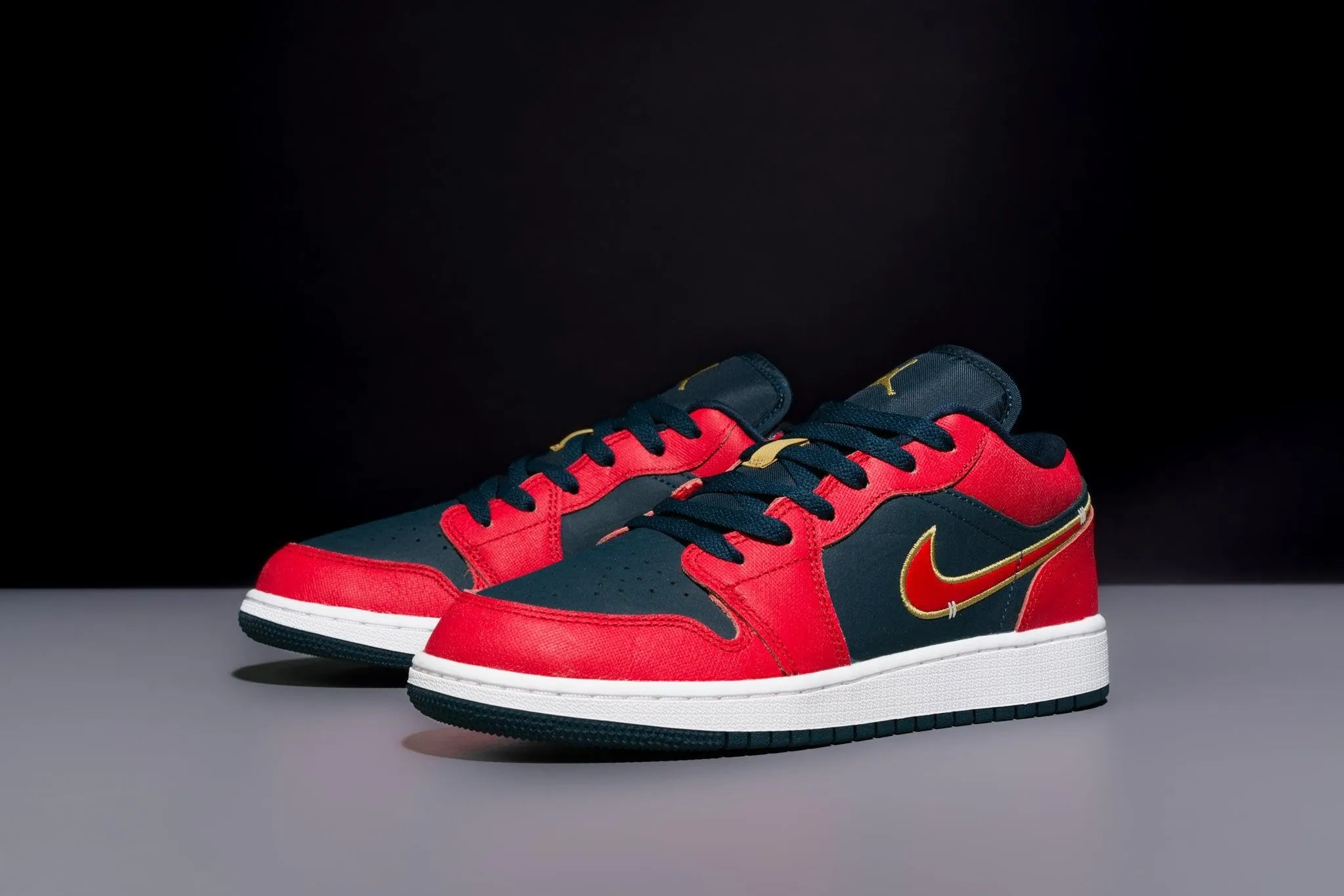 Air Jordan 1 Low SE Kids' Shoes - Navy/Gold/Red - Size 5.5