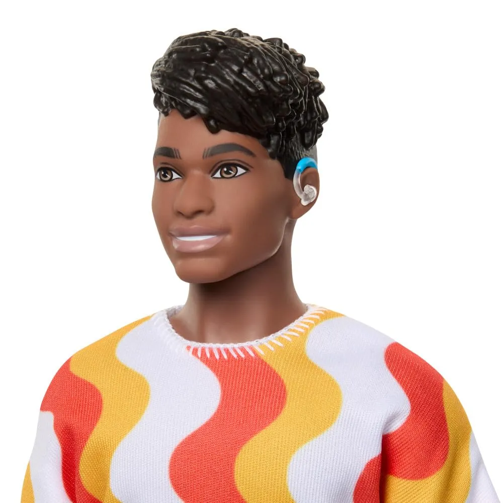 Barbie Fashionistas Ken Doll #220 with Behind-the-Ear Hearing Aids & Broad Body Wearing a Removable Orange Patterned Shirt, Shorts & Jelly Sandals